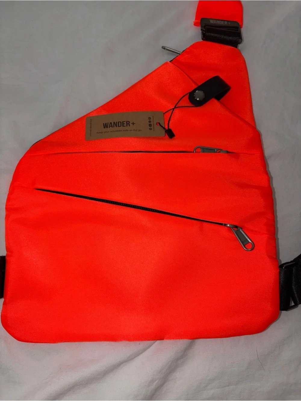 Wander+ Anti-Theft Travel Bag Neon Orange Slim Sling Crossbody Bag NEW
